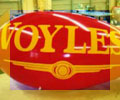 red advertising blimp with Voyles logo